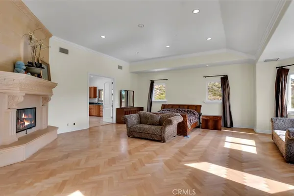 a room with gym equipment and a view of living room