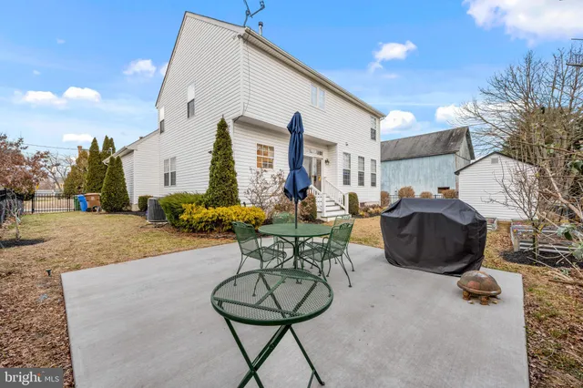 a view of a chairs and tables in patio