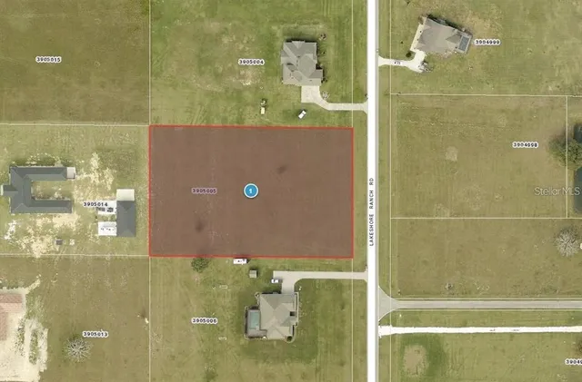 a view of a golf course with green space