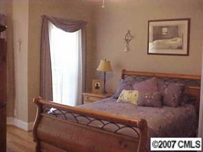 288 Patternote Road Mooresville, NC 28117 - Photo 5 of 8 a bedroom with a bed and a window