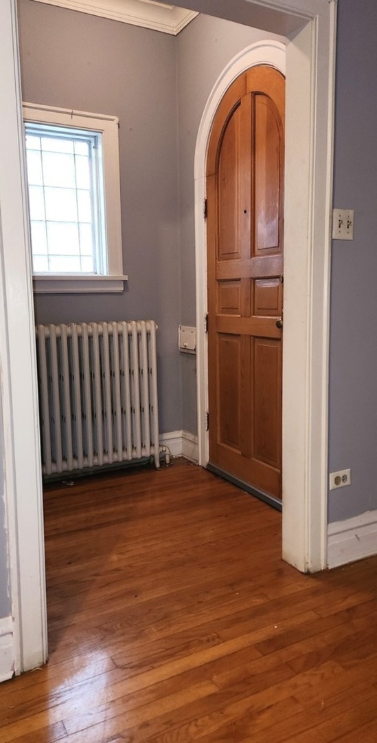 7227 South Bennett Avenue Chicago, IL 60649 - Photo 2 of 47 a view of entryway with wooden floor