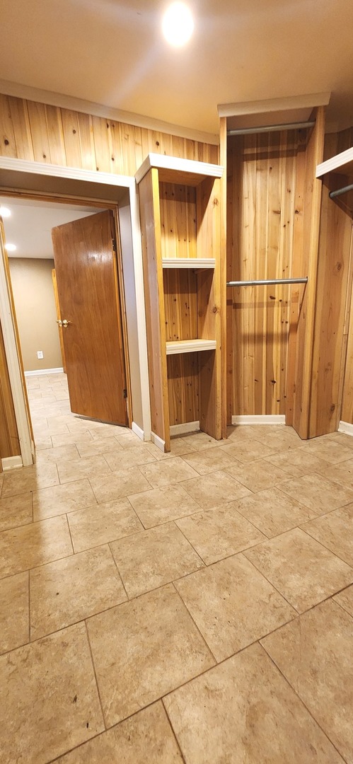 7227 South Bennett Avenue Chicago, IL 60649 - Photo 40 of 47 a view of a room with a wooden walls