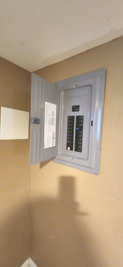 7227 South Bennett Avenue Chicago, IL 60649 - Photo 47 of 47 a view of an empty room with window and fire place