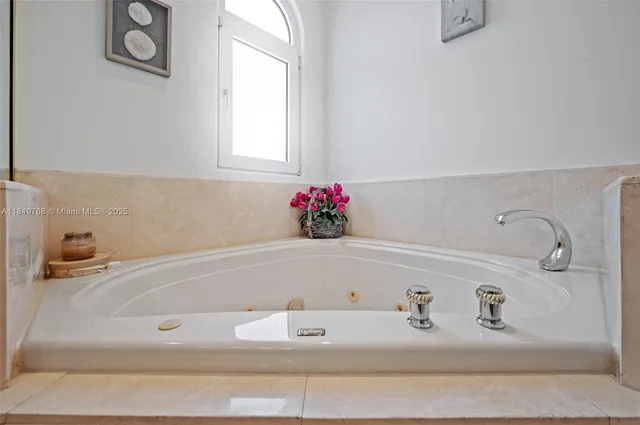 a bedroom with furniture and wooden floor