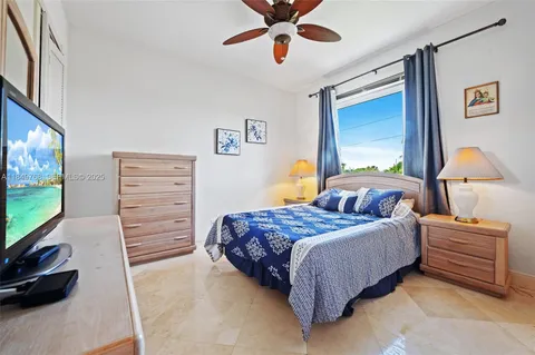 a bedroom with a bed and furniture