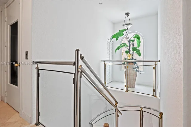 a bathroom with a toilet a sink and a mirror