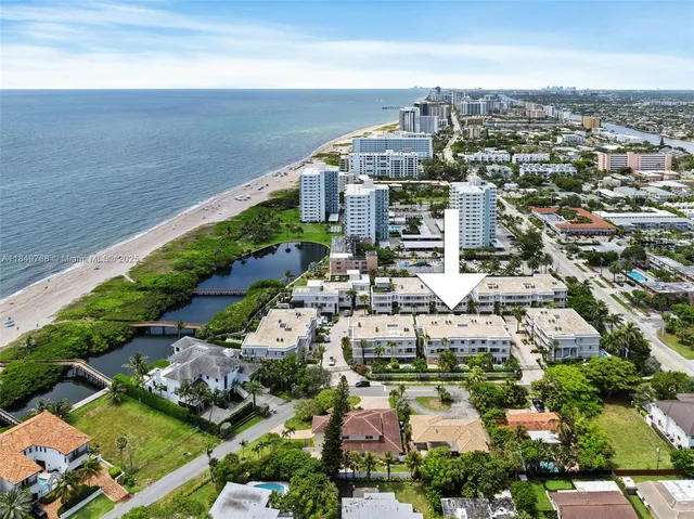a view of a city with an ocean