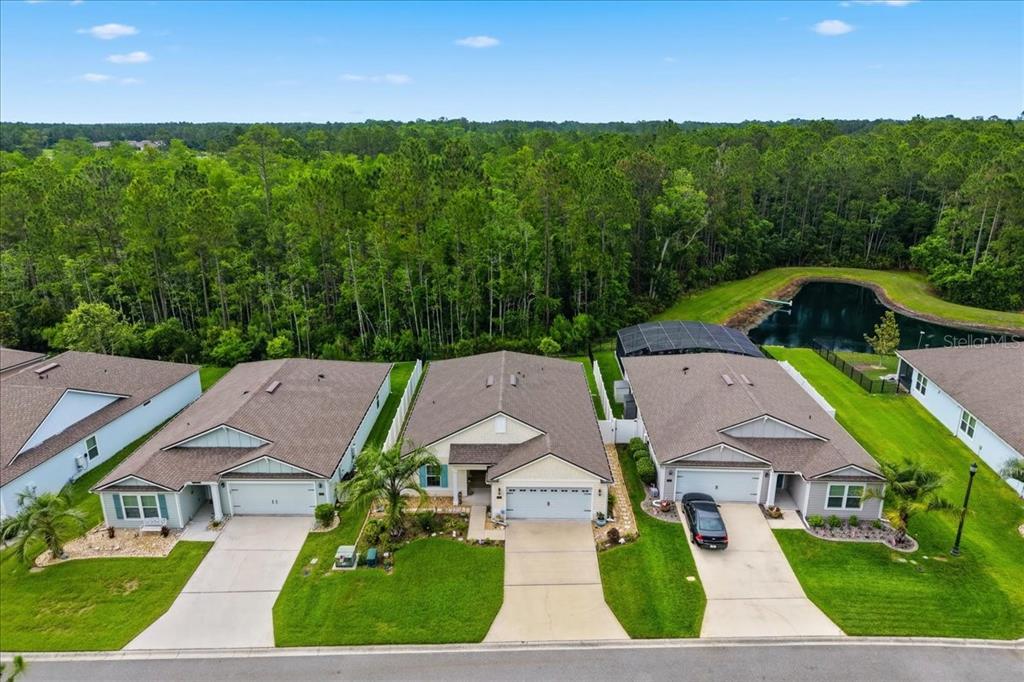 35 Birdie Way Bunnell, FL 32110 - Photo 23 of 57 an aerial view of a house with garden space and a patio