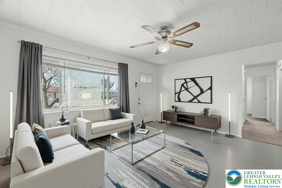 109 South 8th Street Coplay, PA 18037 - Photo 11 of 47 a living room with furniture and a large window