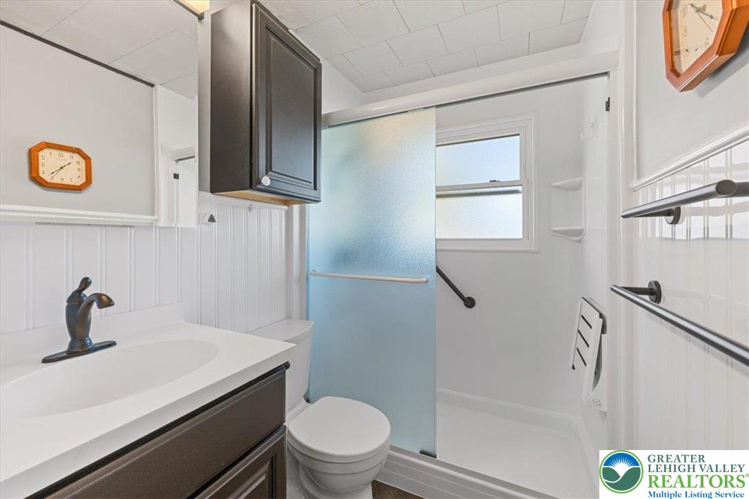 109 South 8th Street Coplay, PA 18037 - Photo 14 of 47 a bathroom with a sink a toilet and shower