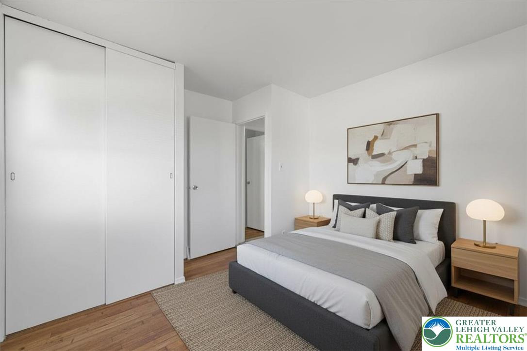 109 South 8th Street Coplay, PA 18037 - Photo 16 of 47 a bedroom with a bed and a painting on the wall