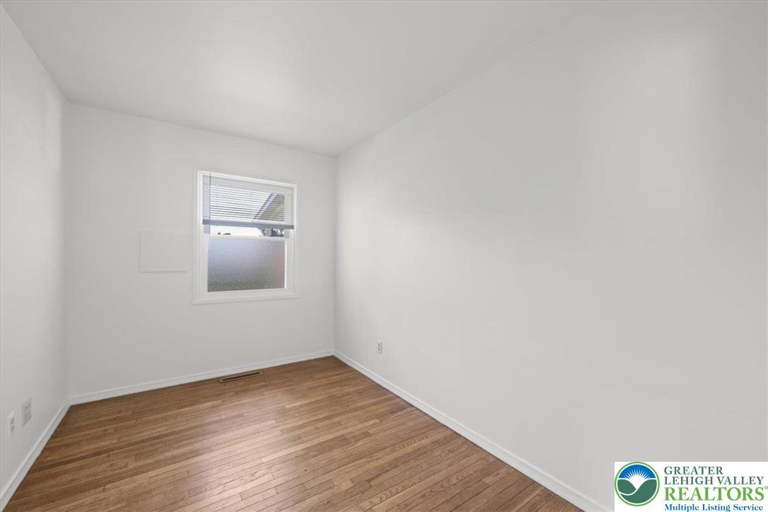 109 South 8th Street Coplay, PA 18037 - Photo 17 of 47 a view of an empty room and wooden floor