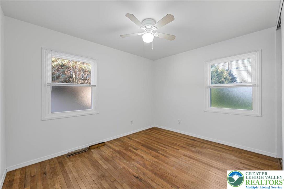 109 South 8th Street Coplay, PA 18037 - Photo 18 of 47 a view of empty room with window and wooden floor