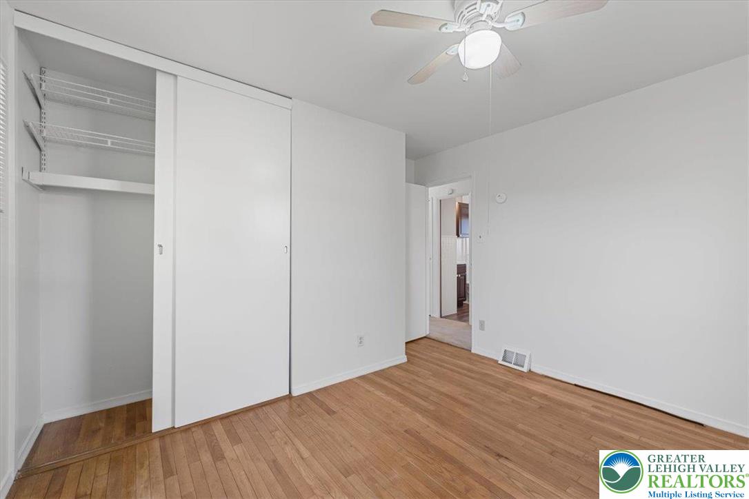 109 South 8th Street Coplay, PA 18037 - Photo 20 of 47 a view of a room with wooden floor and ceiling fan