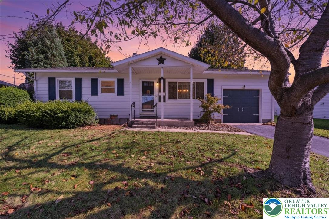 109 South 8th Street Coplay, PA 18037 - Photo 2 of 47 a front view of a house with garden