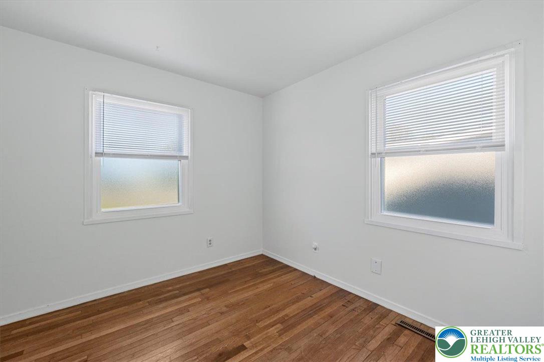 109 South 8th Street Coplay, PA 18037 - Photo 22 of 47 a view of empty room with wooden floor