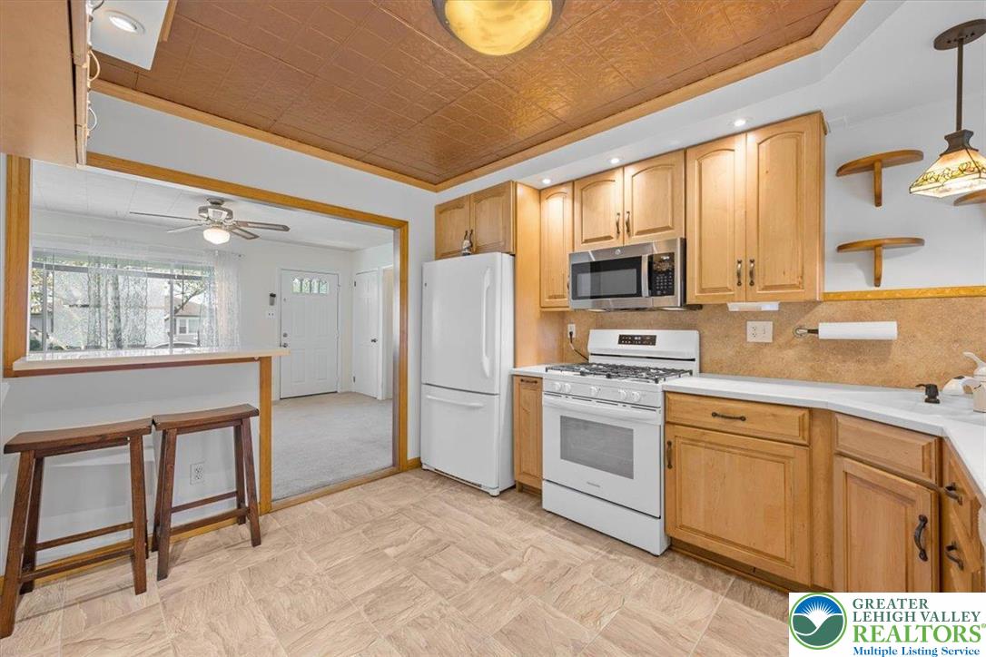 109 South 8th Street Coplay, PA 18037 - Photo 24 of 47 a kitchen with a sink cabinets and stainless steel appliances
