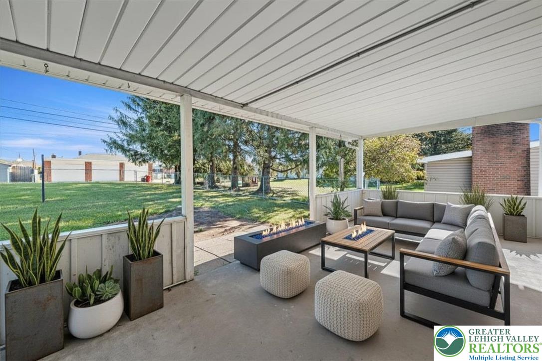 109 South 8th Street Coplay, PA 18037 - Photo 31 of 47 a living room with patio furniture and garden