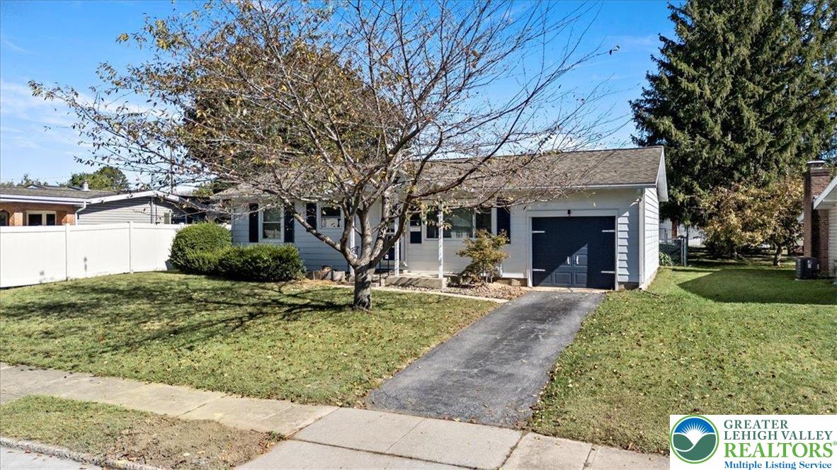 109 South 8th Street Coplay, PA 18037 - Photo 46 of 47 a front view of a house with garden