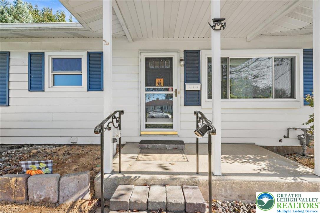 109 South 8th Street Coplay, PA 18037 - Photo 7 of 47 a front view of a house with large windows
