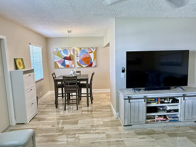 a bathroom with a sink toilet and mirror
