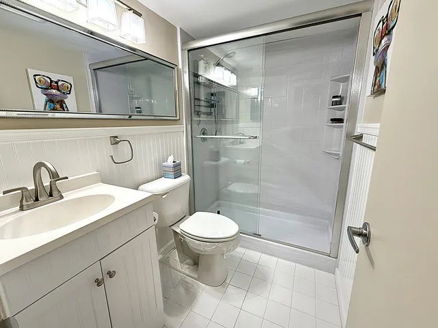 a bedroom with a bed and a closet