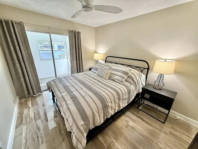 a view of a park with swings and slides