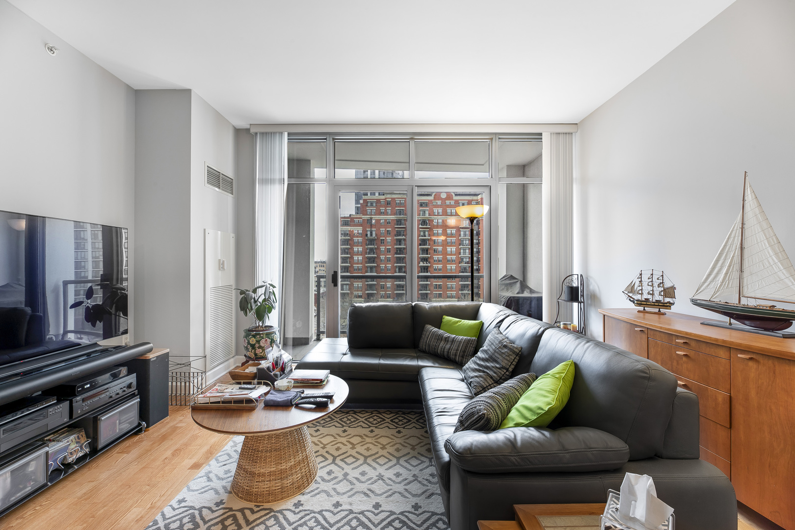 1235 South Prairie Avenue, Unit 706 Chicago, IL 60605 - Photo 3 of 15 a living room with furniture and a flat screen tv
