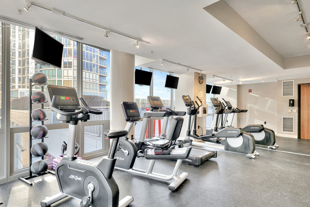 1235 South Prairie Avenue, Unit 706 Chicago, IL 60605 - Photo 10 of 15 a view of a room with gym equipment