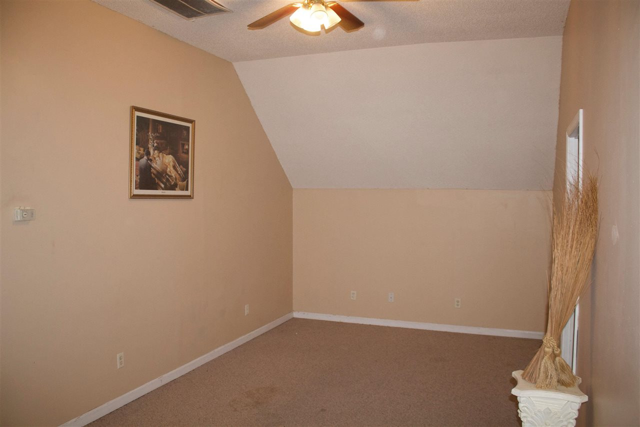 91 Collins Street Ripley, TN 38063 - Photo 11 of 18 an empty room with a window