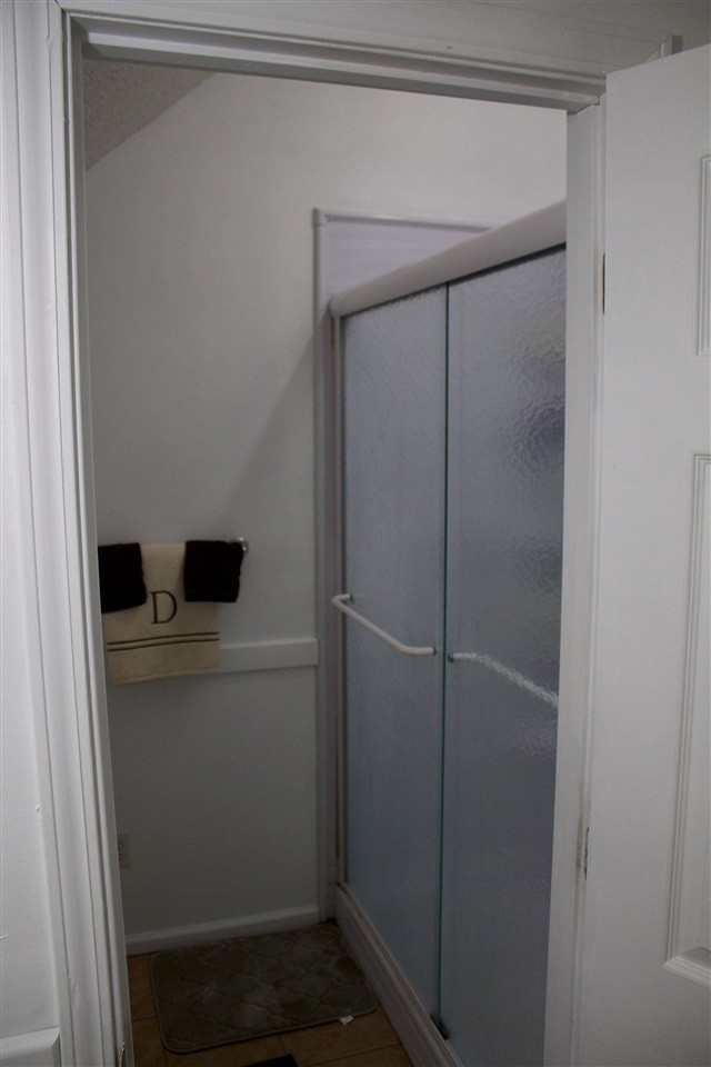 91 Collins Street Ripley, TN 38063 - Photo 15 of 18 a bathroom with a shower