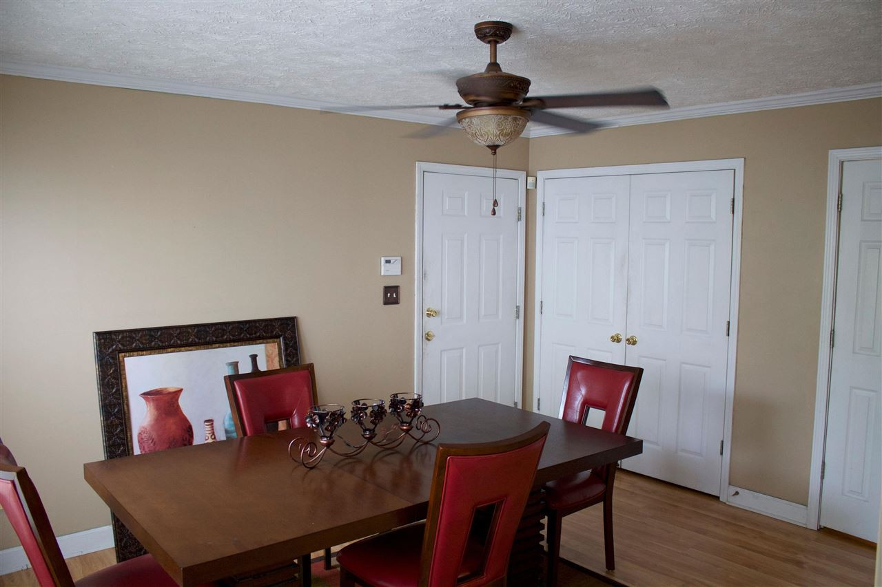 91 Collins Street Ripley, TN 38063 - Photo 7 of 18 a view of a dining room with furniture
