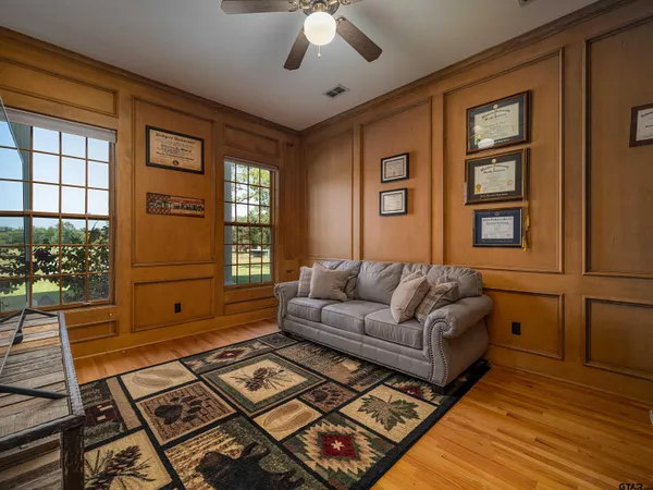 a living room with furniture and a window