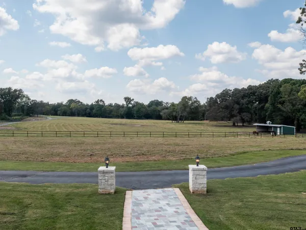 a view of a lake from a yard