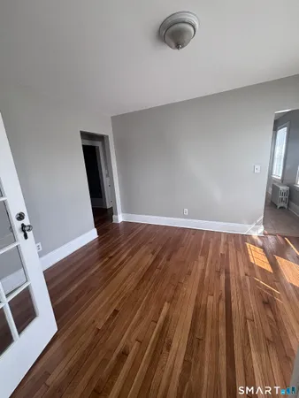 a view of livingroom with hardwood floor and window