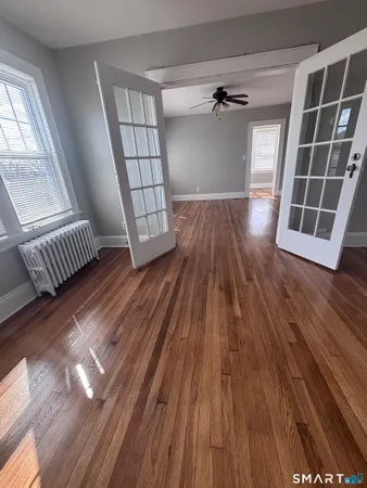 a view of an empty room and window