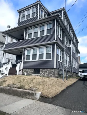 a view of a building with a street