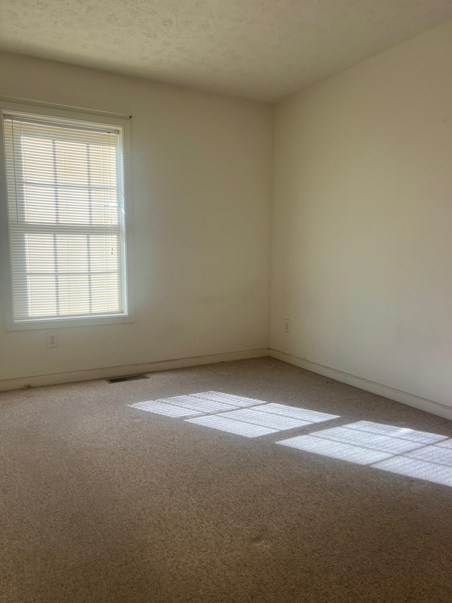 512 F Street Staunton, VA 24401 - Photo 18 of 27 an empty room with a window