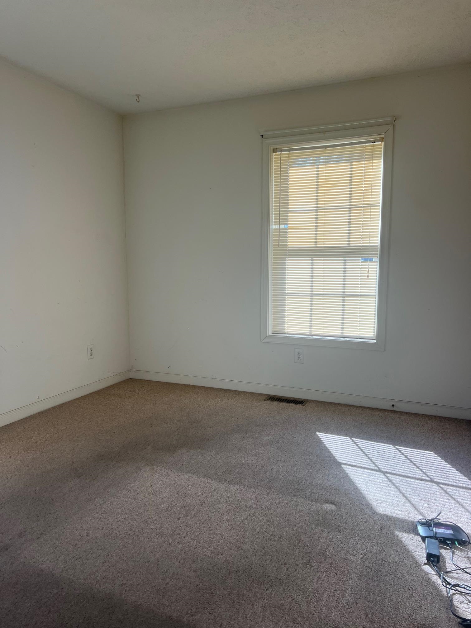 512 F Street Staunton, VA 24401 - Photo 19 of 27 an empty room with a window