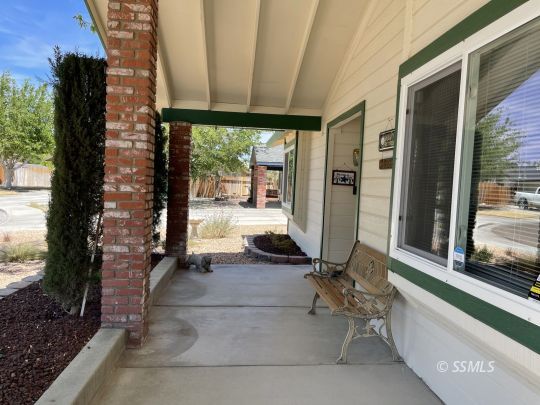 608 Heather Court Ridgecrest, CA 93555 - Photo 2 of 28 a view of a room with a floor to ceiling window and floor to ceiling window