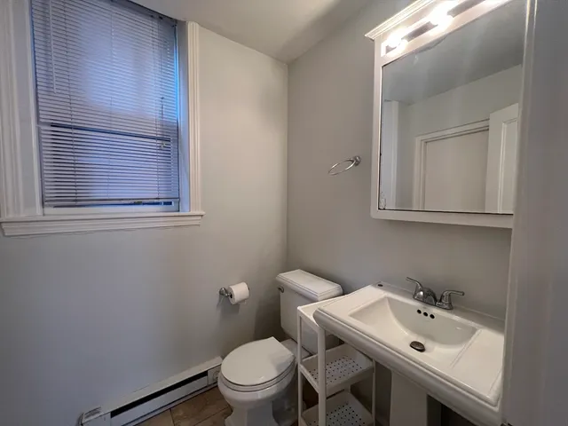 a bathroom with a sink and a toilet