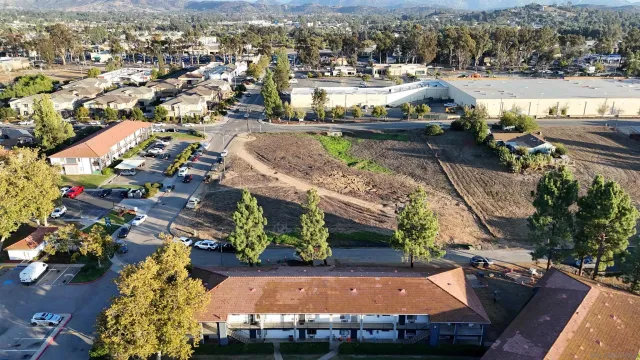 an aerial view of a house with a lake view