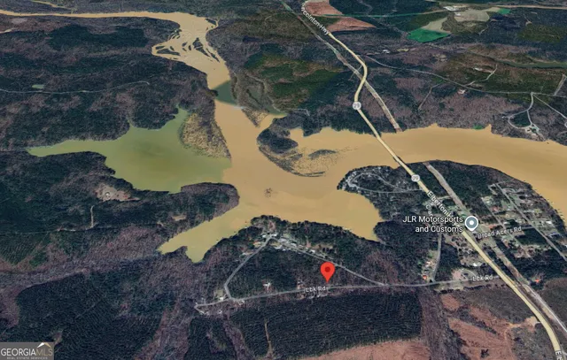 a view of a backyard of the house