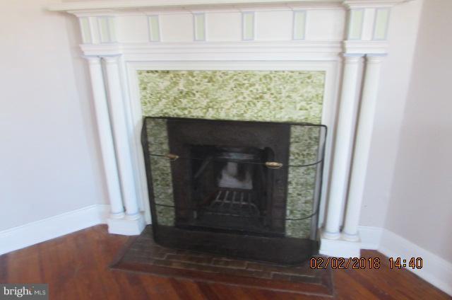 200 Woodlawn Road Baltimore, MD 21210 - Photo 14 of 26 a closeup of a fireplace