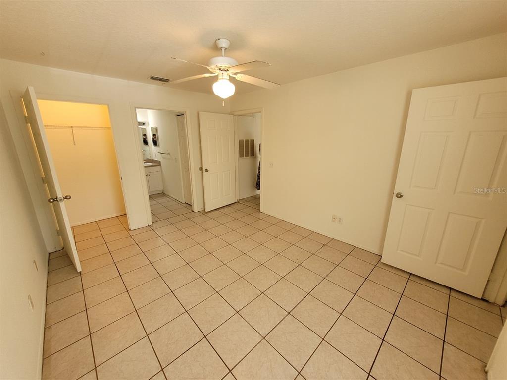 36037 Deer Creek Drive, Unit 102 Zephyrhills, FL 33541 - Photo 15 of 44 an empty room with windows