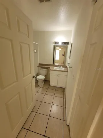 a bathroom with a tub and shower