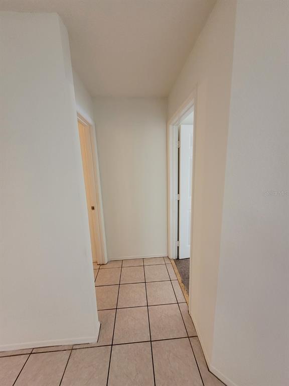 36037 Deer Creek Drive, Unit 102 Zephyrhills, FL 33541 - Photo 21 of 44 a view of an empty room