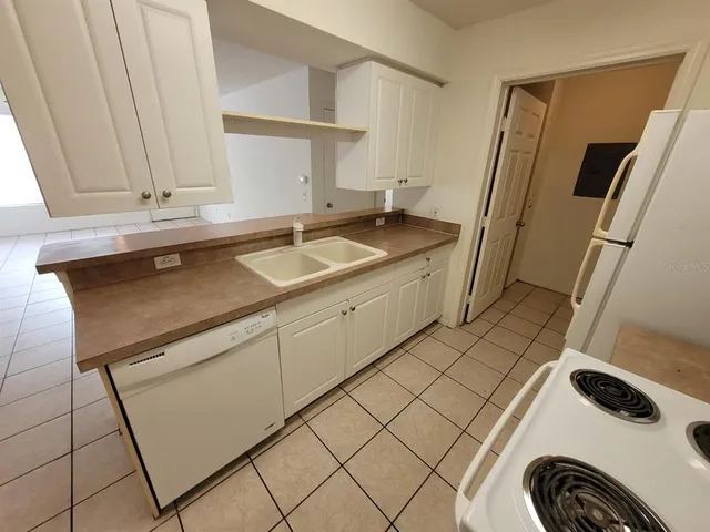 a sink a washer and dryer