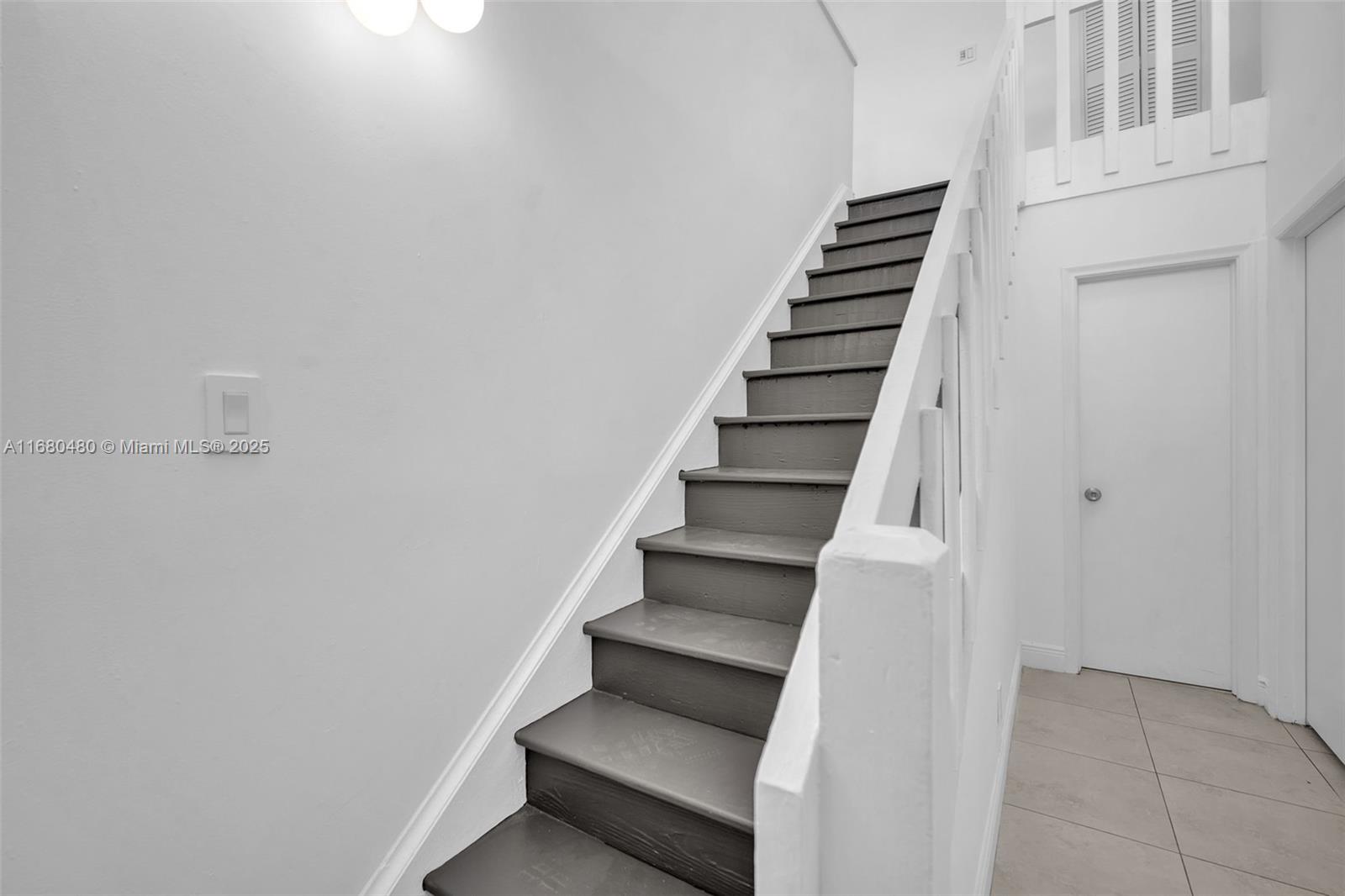 11533 Southwest 109th Road, Unit 21G Miami, FL 33176 - Photo 29 of 39 a view of entryway with stairs