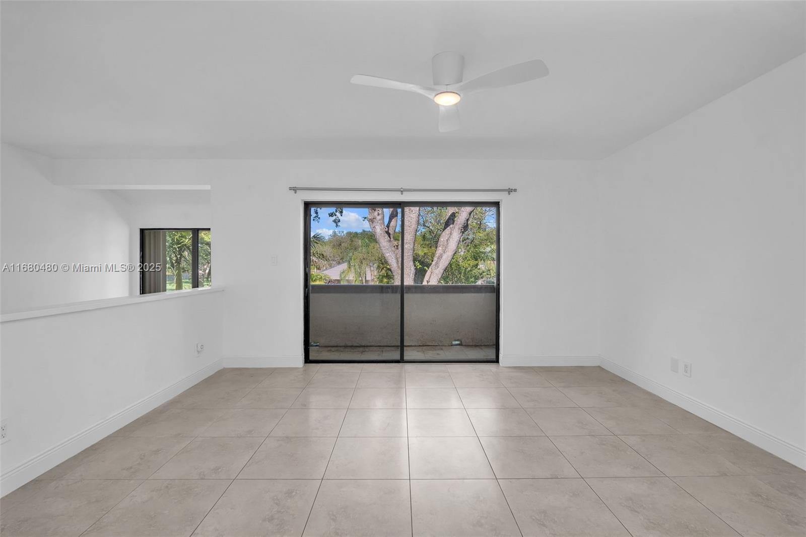 11533 Southwest 109th Road, Unit 21G Miami, FL 33176 - Photo 8 of 39 a view of a room with an empty room